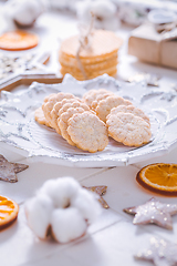 Image showing Christmas cookies with orange slices, ornaments on white background