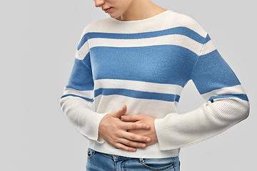 Image showing teenage girl having stomach ache