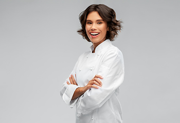 Image showing smiling female chef in toque