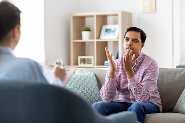 Image showing man and psychologist at psychotherapy session