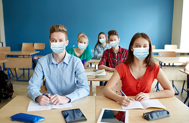 Image showing group of students in masks at school lesson