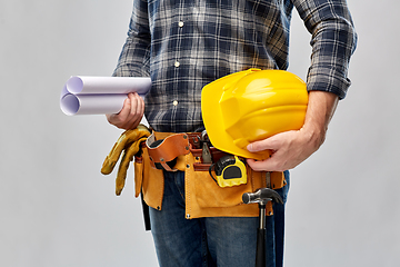 Image showing builder with helmet, blueprint and working tools