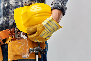 Image showing worker or builder with helmet and working tools