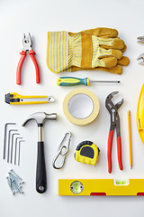 Image showing different work tools on white background