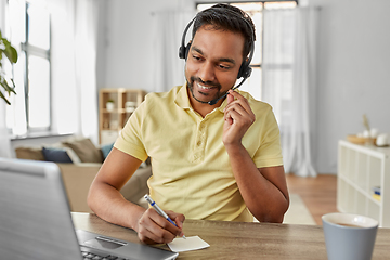 Image showing indian man with headset and laptop working at home