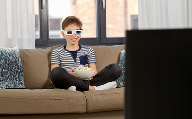 Image showing boy in 3d movie glasses and watching tv at home