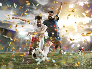 Image showing Professional sportsmen caught in moment of winning and confetti flying, motion and action