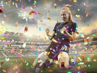 Image showing Professional sportswoman caught in moment of winning and confetti flying, motion and action