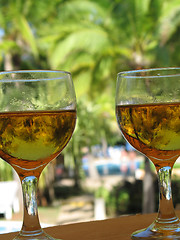 Image showing beer glasses by the pool