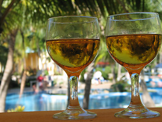 Image showing beer glasses by the pool