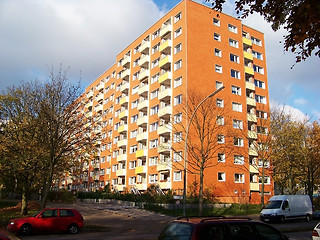 Image showing The red many-storeyed house