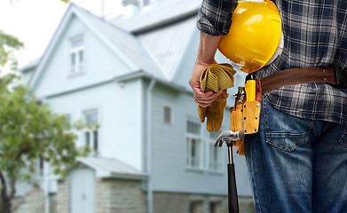 Image showing worker or builder with helmet and working tools