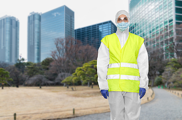 Image showing healthcare or sanitation worker in hazmat suit