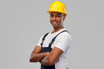 Image showing happy indian worker or builder with crossed arms