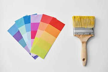 Image showing paint brush and color palette on white background