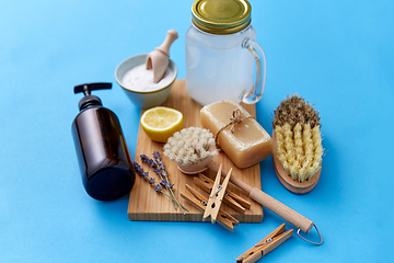 Image showing washing soda, soap, brushes, lemon and clothespins