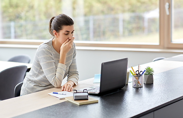 Image showing woman with laptop working at home office