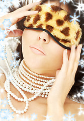 Image showing pearls and leopard mask