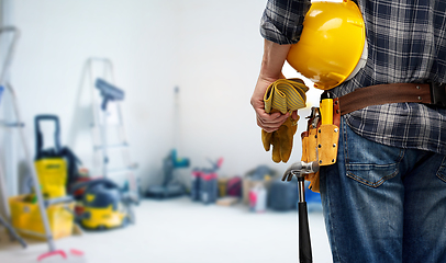 Image showing worker or builder with helmet and working tools