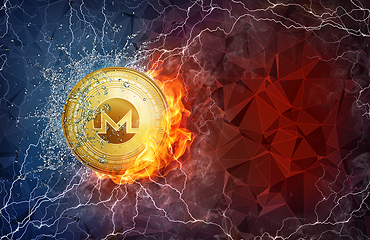 Image showing Gold Monero coin hard fork in fire flame, lightning and water splashes.