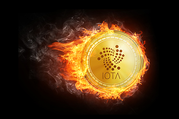 Image showing Golden IOTA coin flying in fire flame.