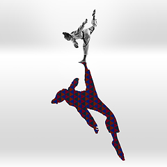 Image showing Young caucasian sportswoman isolated on studio background with shadow, modern artwork. Abstract trendy design.