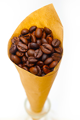 Image showing espresso coffee beans on a paper cone