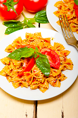 Image showing Italian pasta farfalle butterfly bow-tie and tomato sauce