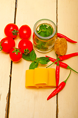 Image showing Italian pasta paccheri with tomato mint and chili pepper