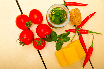 Image showing Italian pasta paccheri with tomato mint and chili pepper