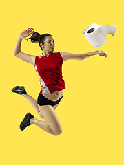 Image showing Professional sportswoman caught toiletpaper in motion and action - high demand for essential goods