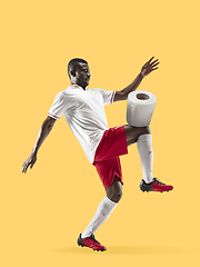 Image showing Professional sportsman caught toiletpaper in motion and action - high demand for essential goods