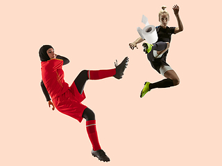 Image showing Professional sportswomen fight fo toiletpaper in motion and action - high demand for essential goods