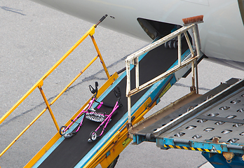 Image showing AMSTERDAM, NETHERLANDS - JUNE 29, 2017: Loading luggage in airpl