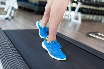 Image showing Woman running on treadmill