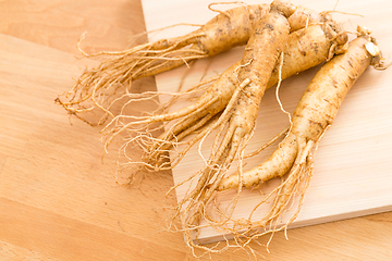 Image showing Korean fresh ginseng over wooden texture