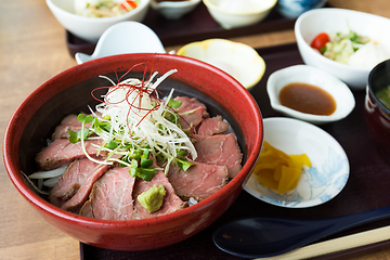 Image showing Rare beef rice don in Japanese restaurant