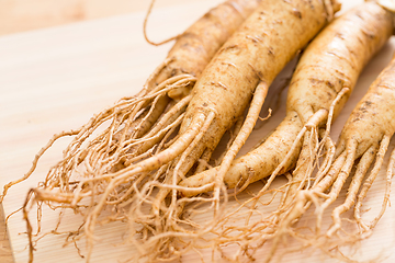 Image showing Ginseng over wooden background