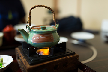 Image showing Heating teapot