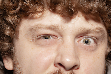 Image showing Close up of face of beautiful caucasian young man, focus on eyes