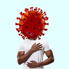 Image showing Man headed by model of COVID-19 coronavirus, concept of pandemic spreading