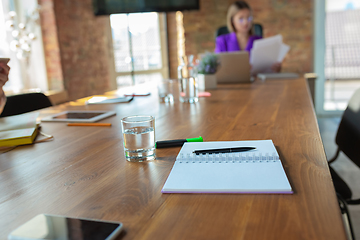 Image showing Young caucasian business woman working in office, diversity and girl power concept