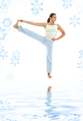 Image showing yoga standing on white sand