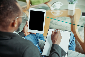 Image showing Businessman or student working from home while being isolated or keep quarantine \'cause of coronavirus COVID-19