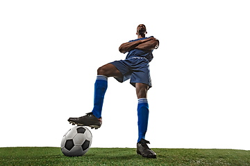 Image showing Football or soccer player on white background - motion, action, activity concept, wide angle