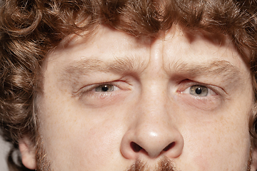 Image showing Close up of face of beautiful caucasian young man, focus on eyes