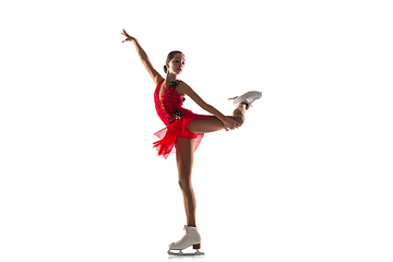 Image showing Girl figure skating isolated on white studio backgound with copyspace