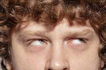 Image showing Close up of face of beautiful caucasian young man, focus on eyes