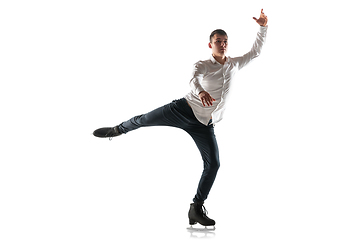 Image showing Man figure skating isolated on white studio backgound with copyspace