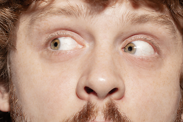 Image showing Close up of face of beautiful caucasian young man, focus on eyes